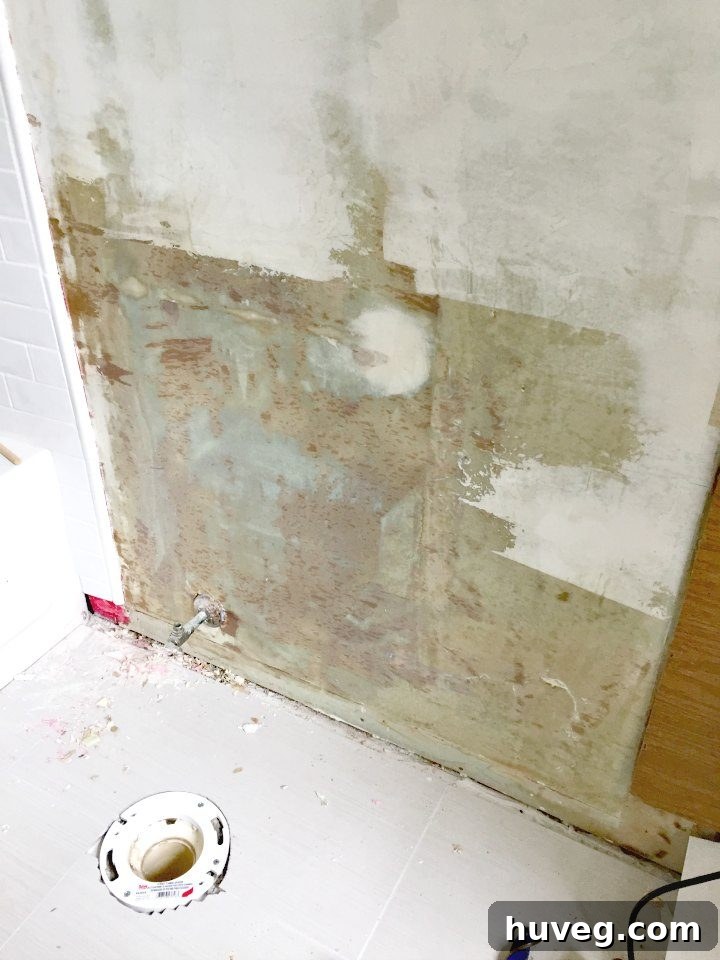 Patching drywall before toilet installation
