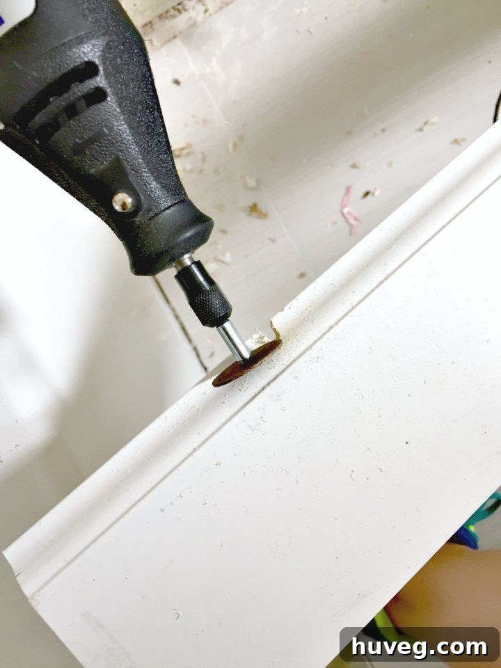 Trim baseboard to fit tile seamlessly