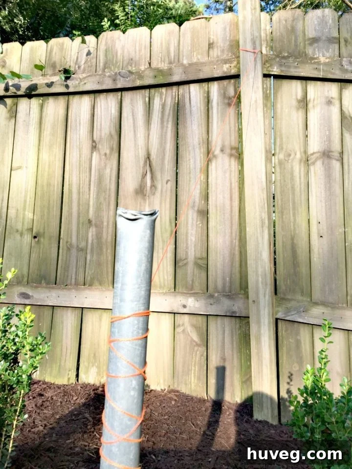 Using string to help straighten out fence