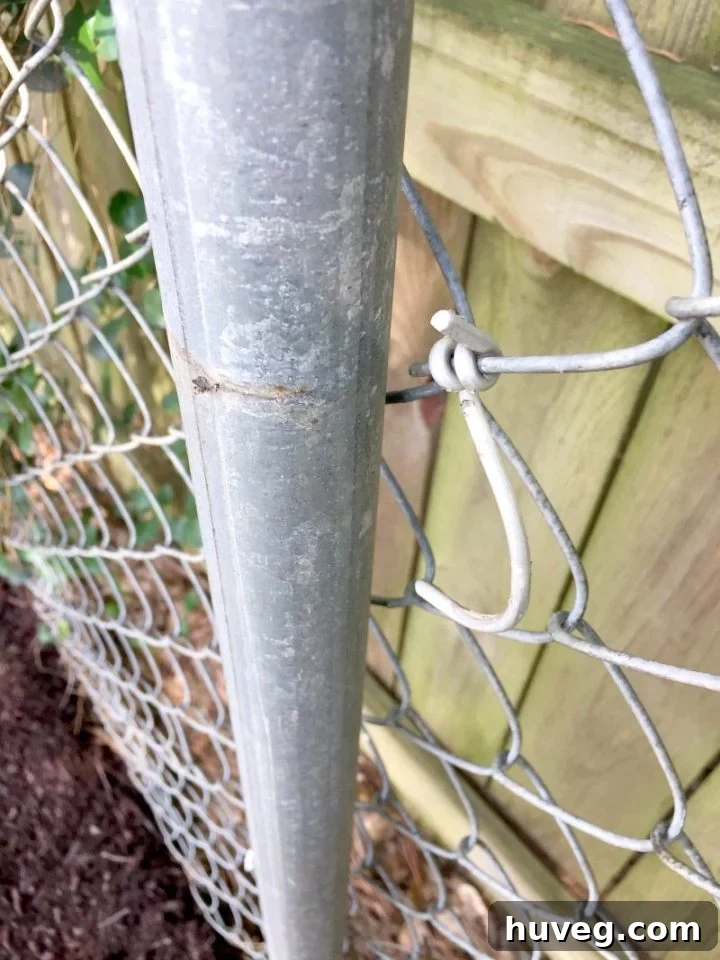 how to remove chain link fence