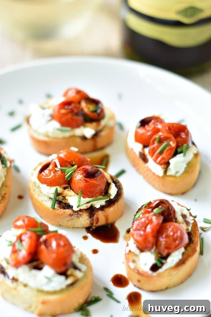 Scrumptious Herbed Goat Cheese Crostini with Roasted Cherry Tomatoes and Balsamic Glaze