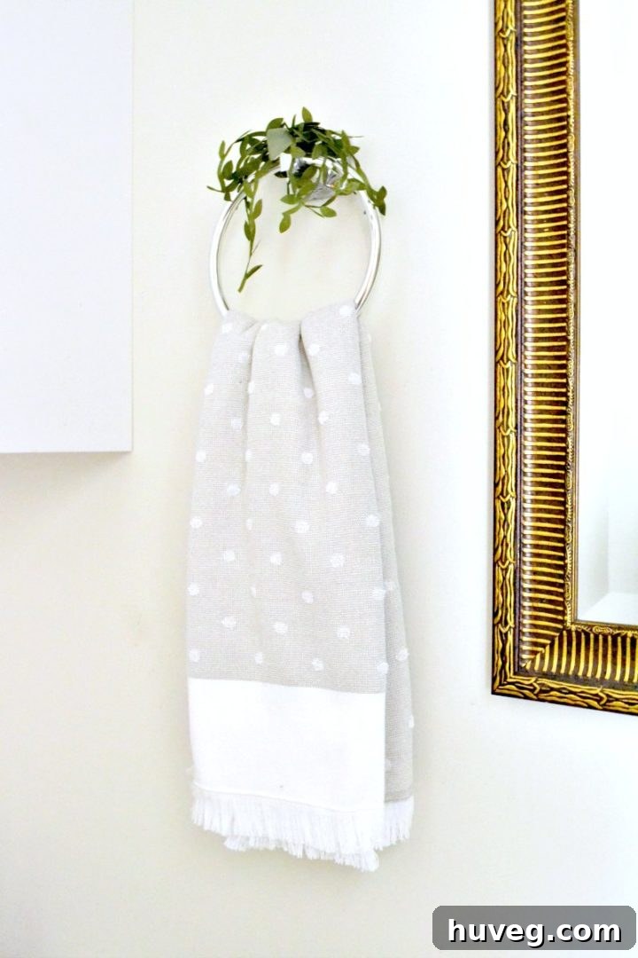 adding greenery and new towels to hall bathroom