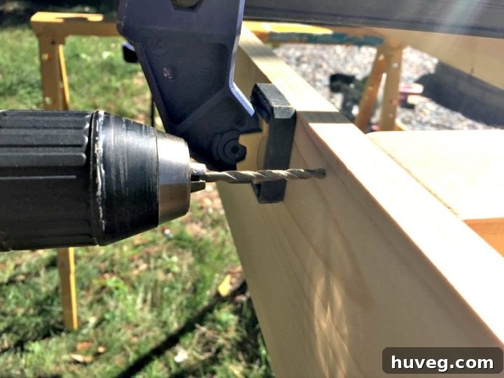 Drilling holes for dowel placements to strengthen the drink tray
