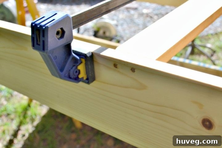 Using dowels for extra support along the bottom of the DIY drink station