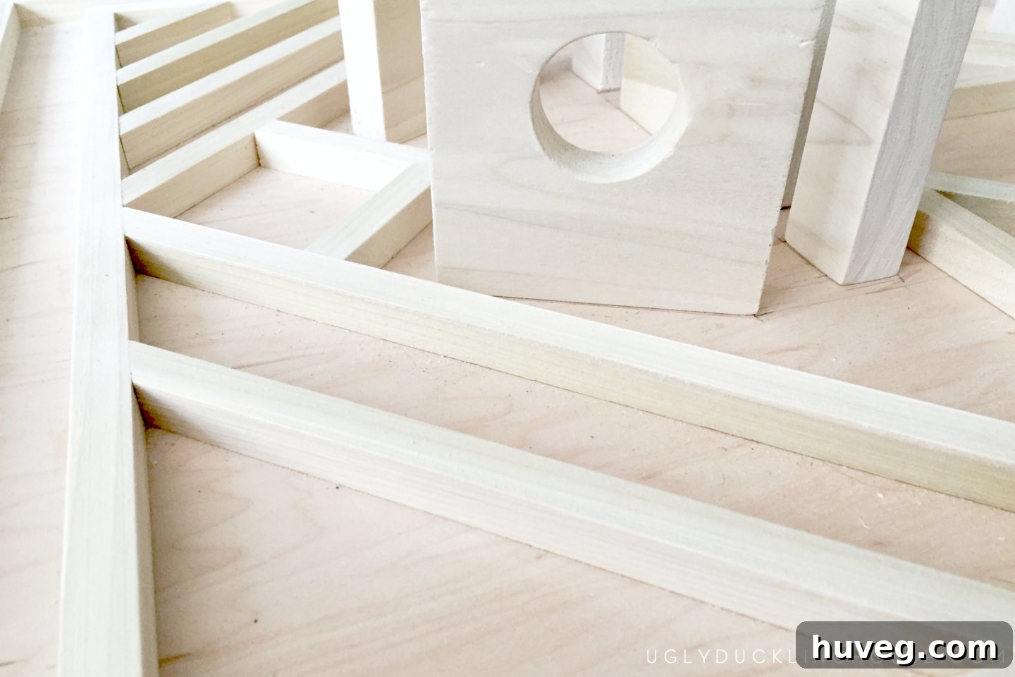 Gluing every plywood dowel piece into place for the art wine rack