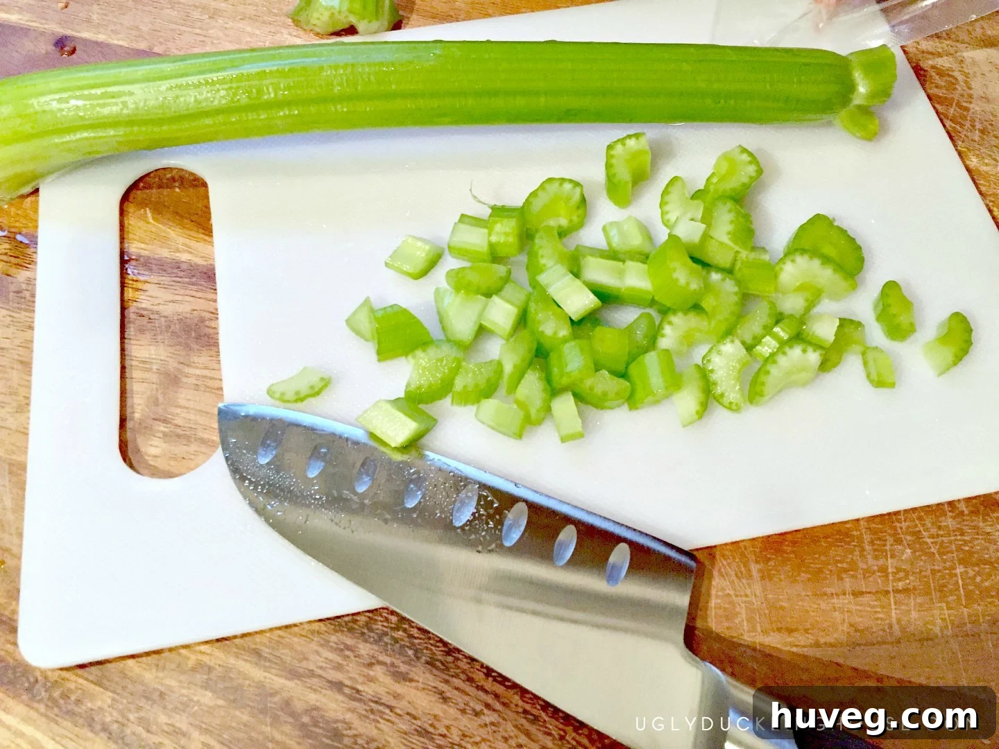Preparing ingredients in a newly renovated kitchen, symbolizing readiness for entertaining