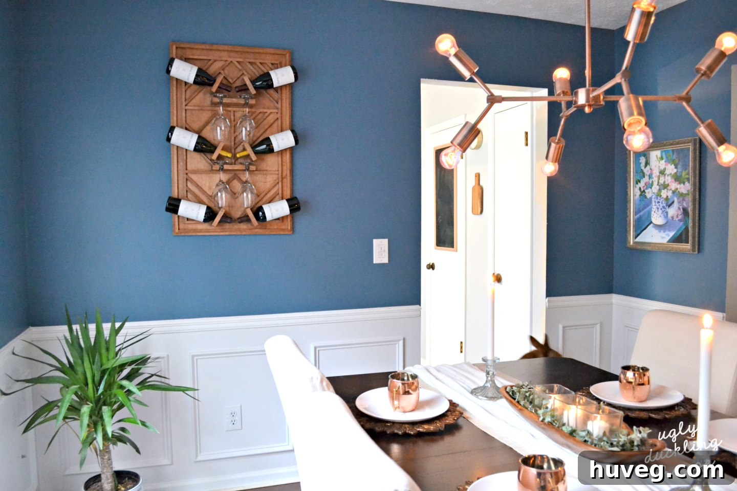 New plywood art wine rack mounted on the dining room wall, showcasing its design and placement
