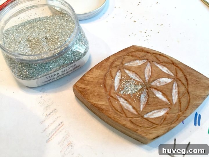 painting glue and sprinkling in german glass glitter