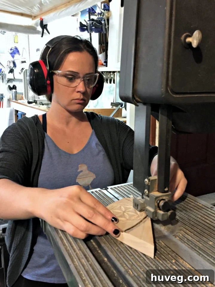 Working with a band saw on a DIY project at Ugly Duckling House
