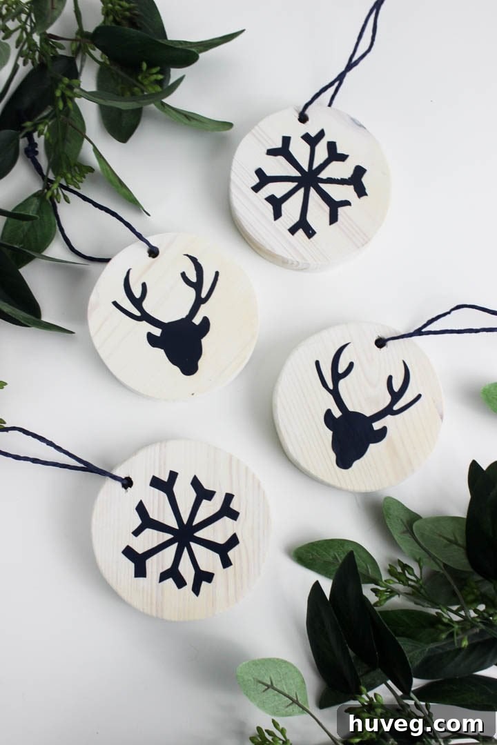 Variety of finished white washed reindeer ornaments displayed