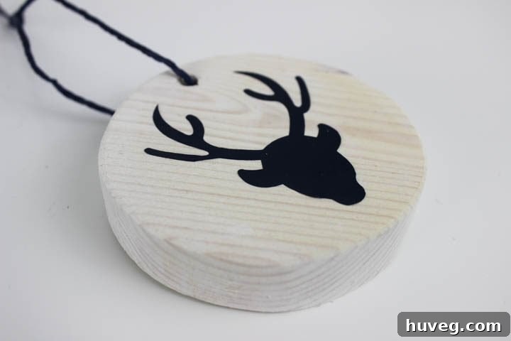 Collection of DIY white washed ornaments with various reindeer designs