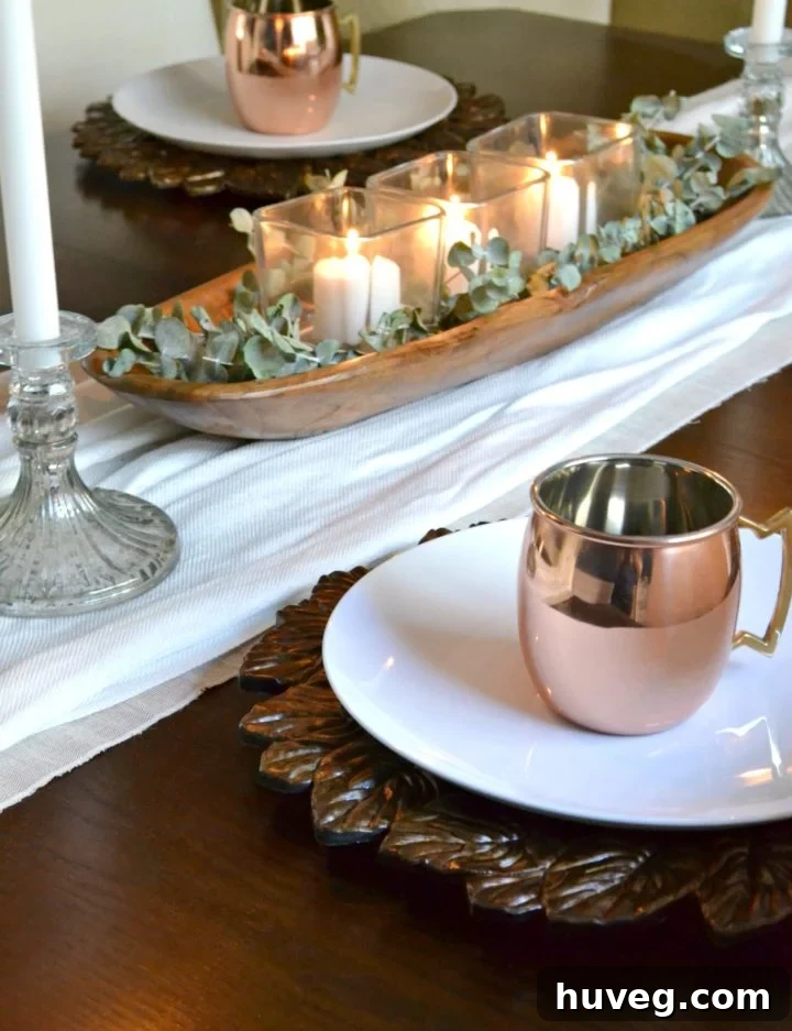 simple dough bowl with eucalyptus and copper accents - thanksgiving table