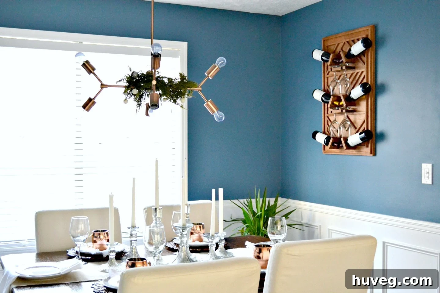 Christmas dining room decor featuring elegant copper mugs and festive accents