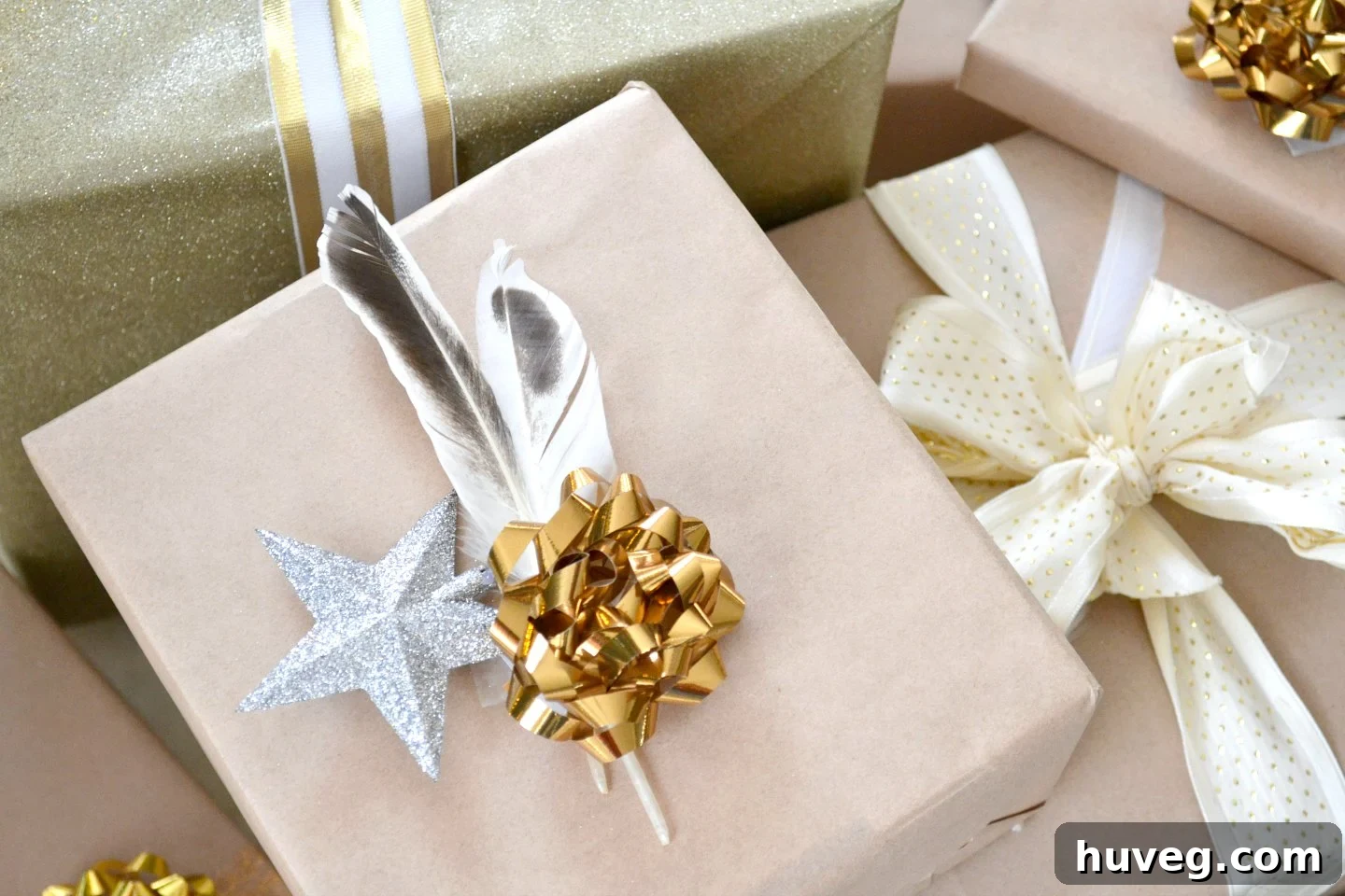 gold and neutrals - woodland theme gift wrapping with feathers