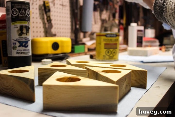 Beautifully finished triangle tea light holders displayed as thoughtful and handmade gifts.