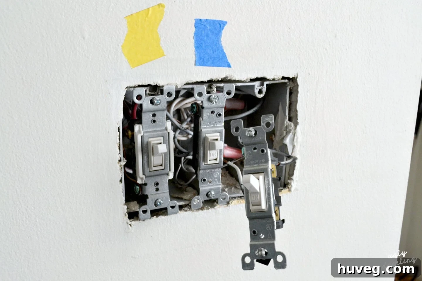 removing old switches to install new ones