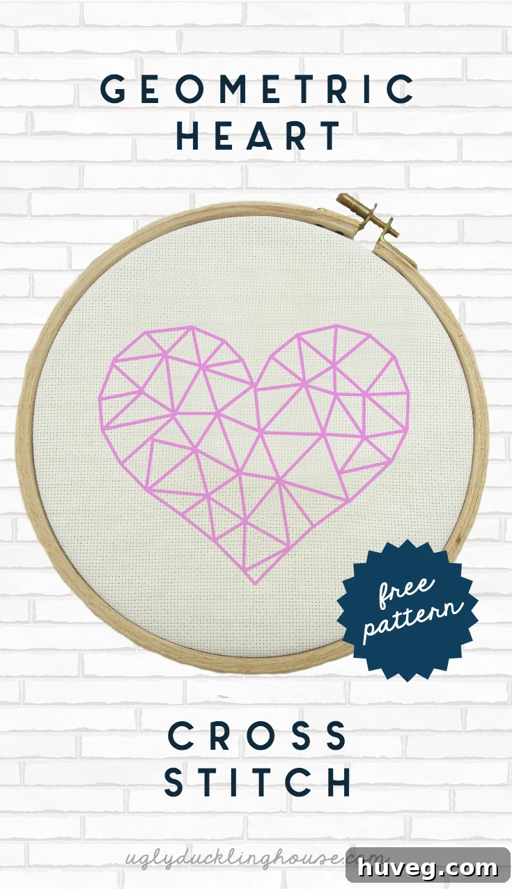 Beautiful pink geometric heart cross stitch pattern, ideal for Valentine's Day crafting