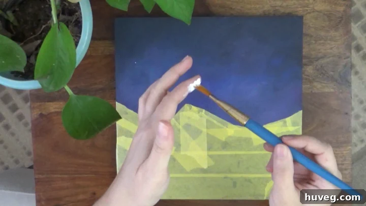 flicking white paint to make stars