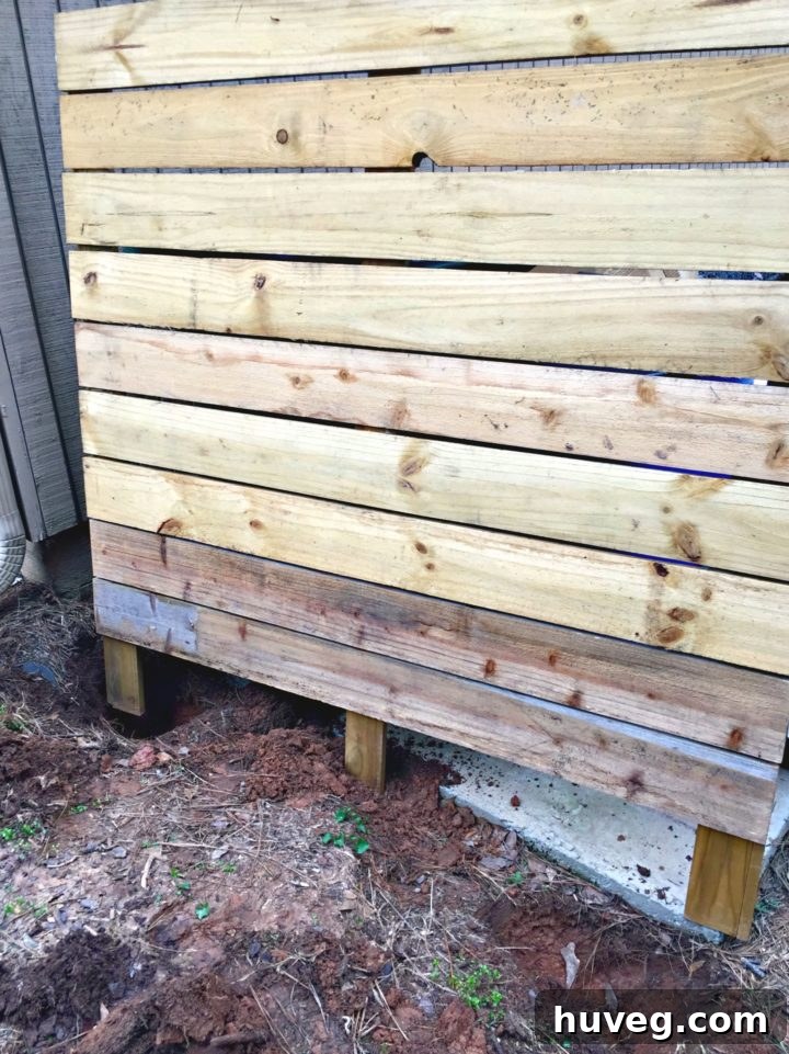 Wood screen for trash bins, a clever DIY solution for concealing outdoor unsightly items