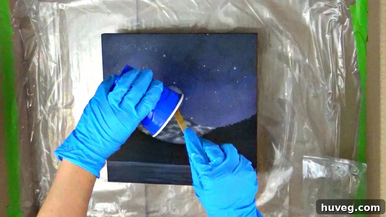 pour resin onto painting
