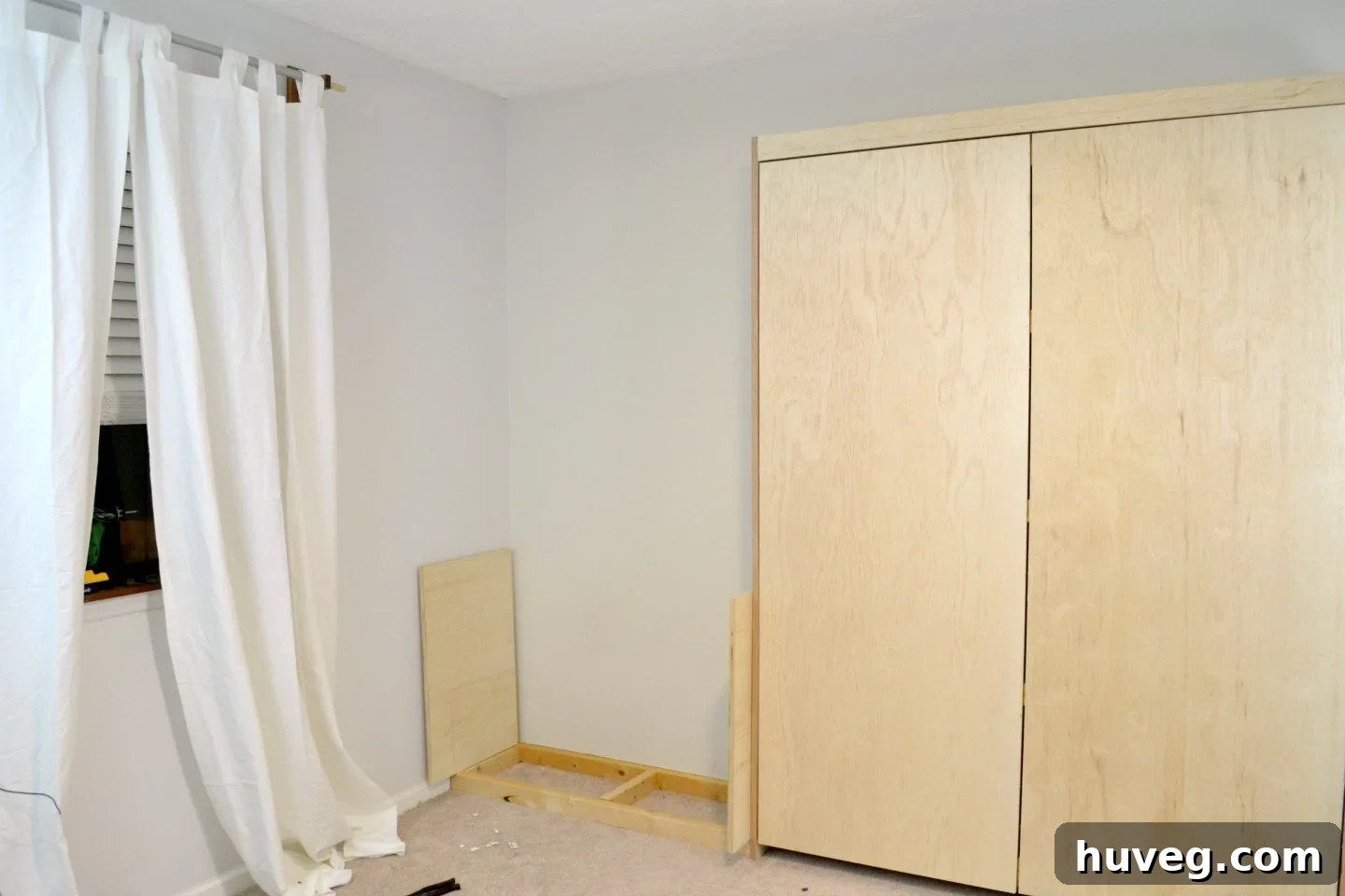left side of murphy bed with working out details of cabinetry