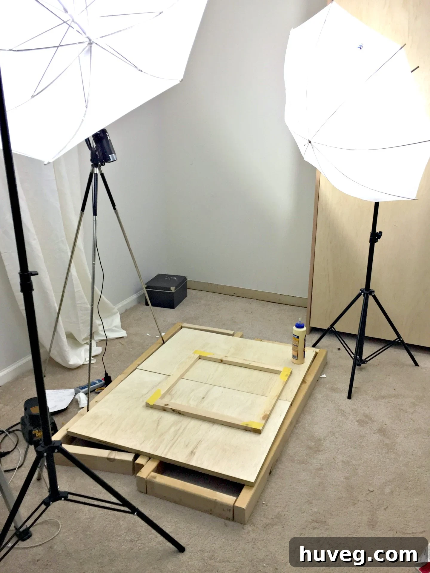 An array of repurposed wood pieces, artfully arranged on my makeshift photo studio floor in the spare room, ready for transformation into modern wall art.