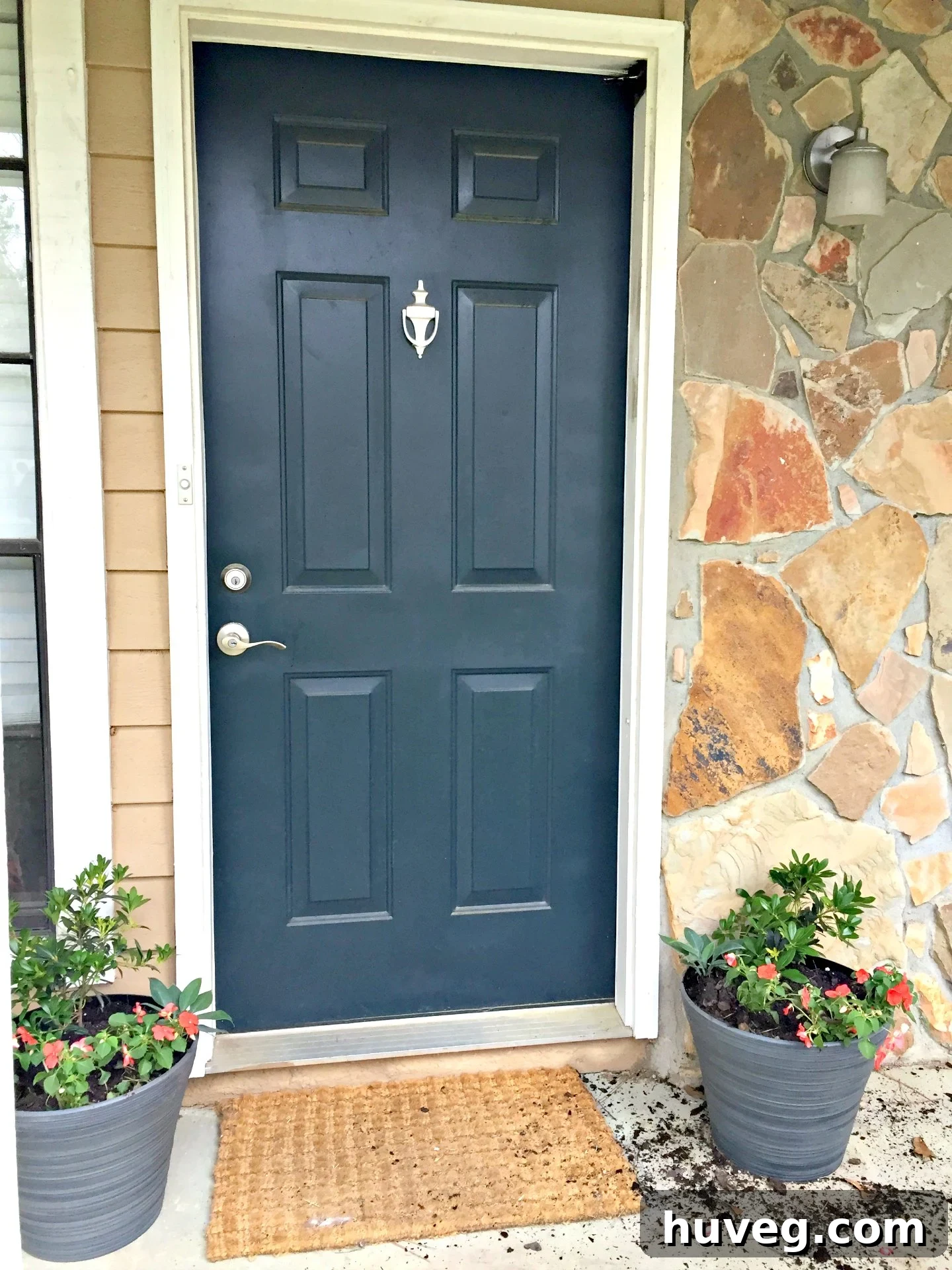 Freshly arranged new porch planters, vibrant and welcoming