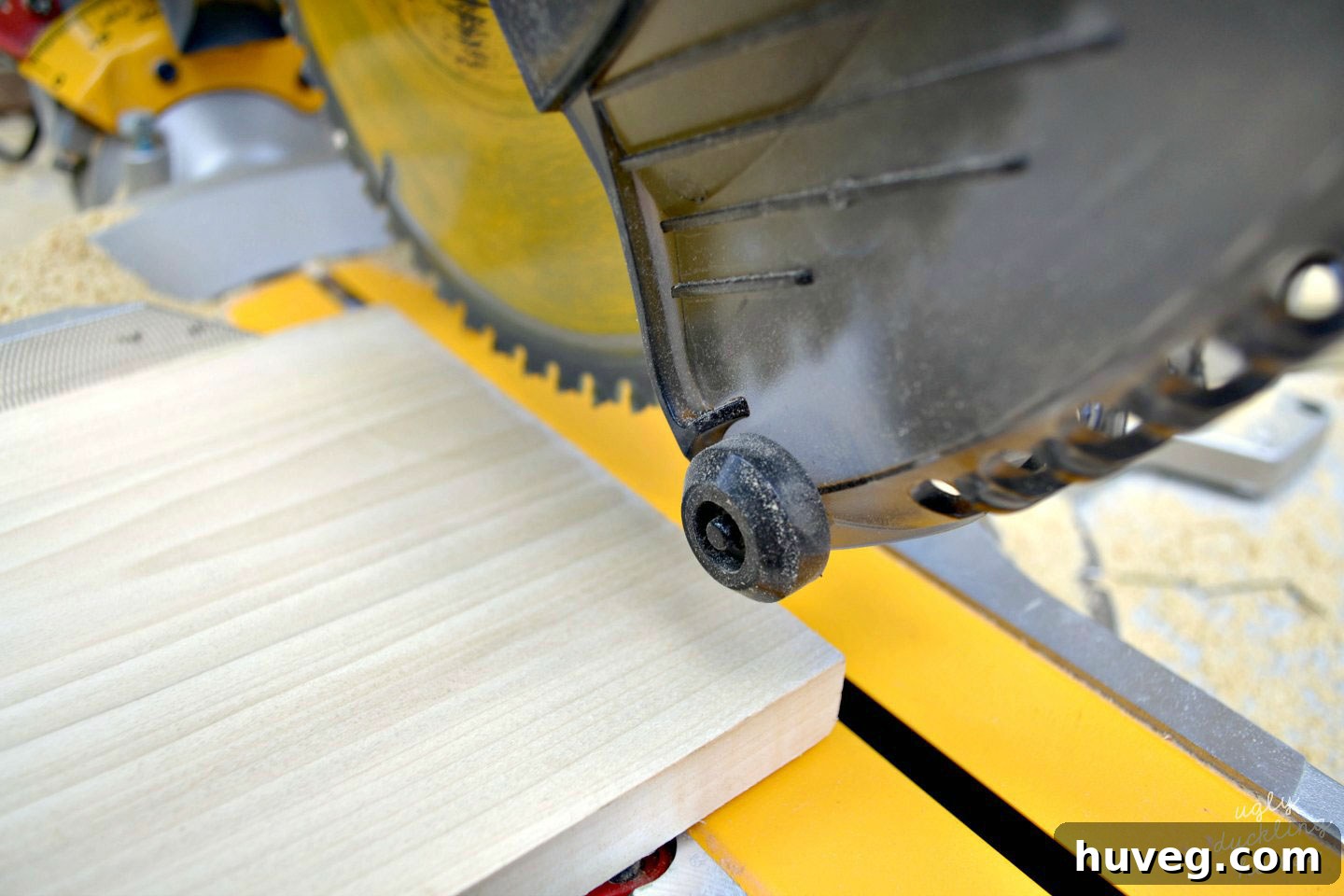 Cutting wooden poplar pieces with a saw for my s’mores tray