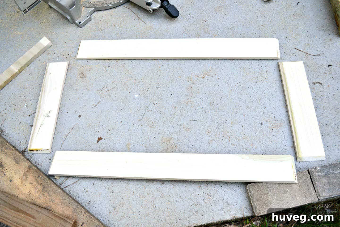 Set out the four cut pieces that will form the sides of your wooden s'mores tray.