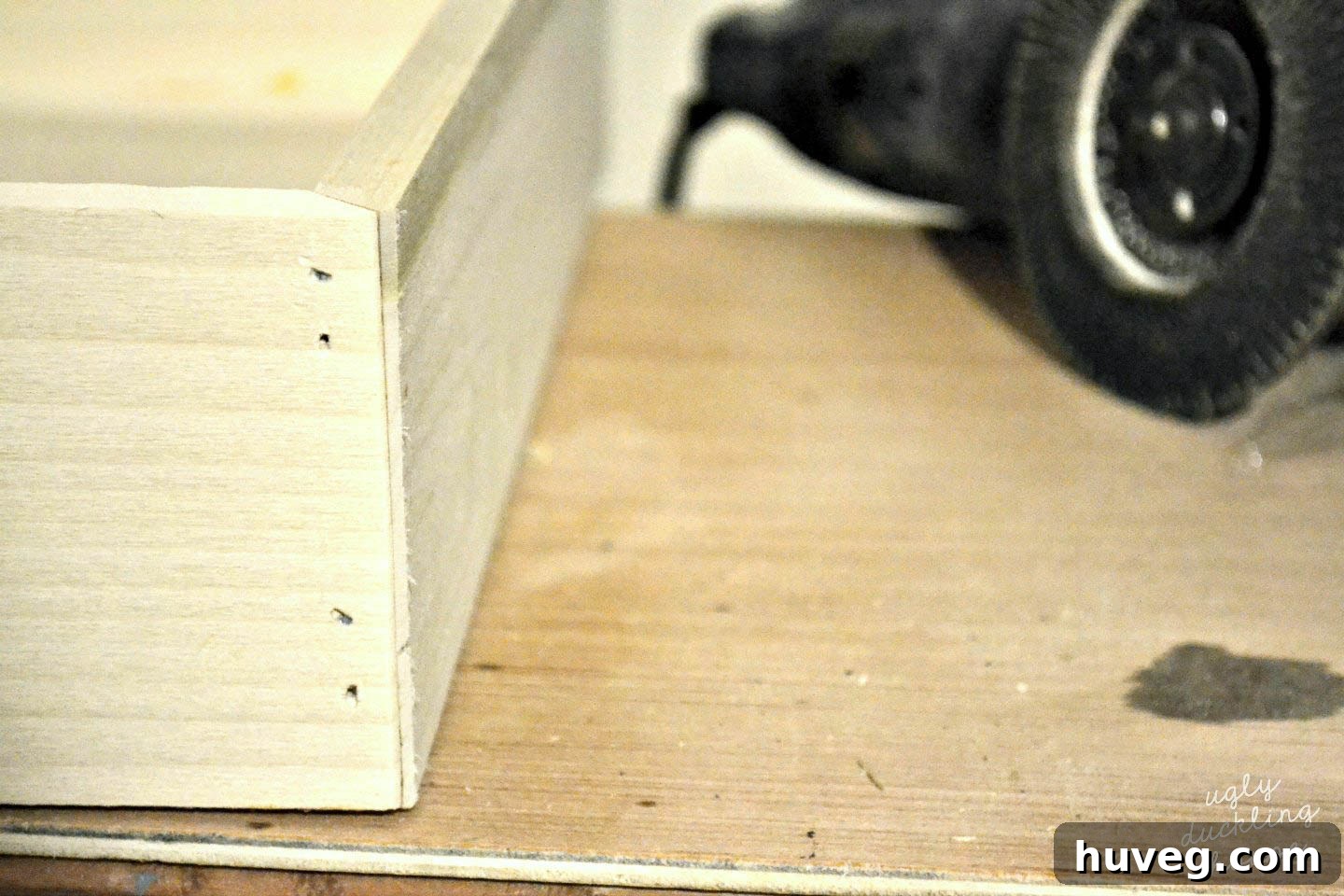 For a professional finish, add a small chamfer to the four corners of your s'mores tray, using an angle grinder.
