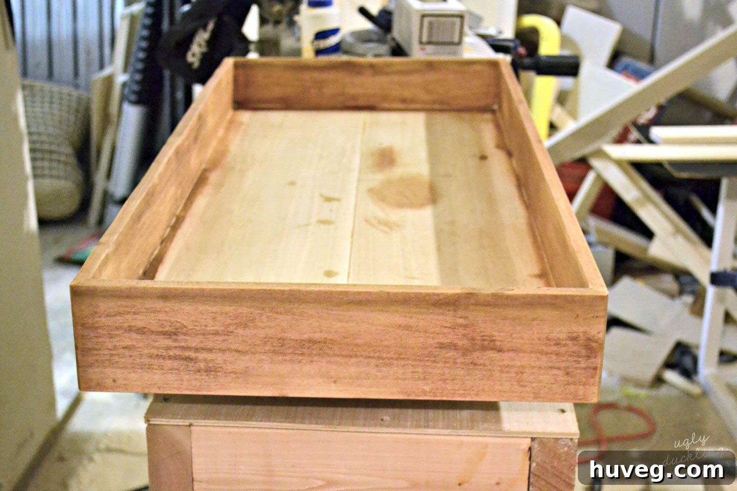 Once your s’mores tray is put together, putty, sand, and stain the tray.
