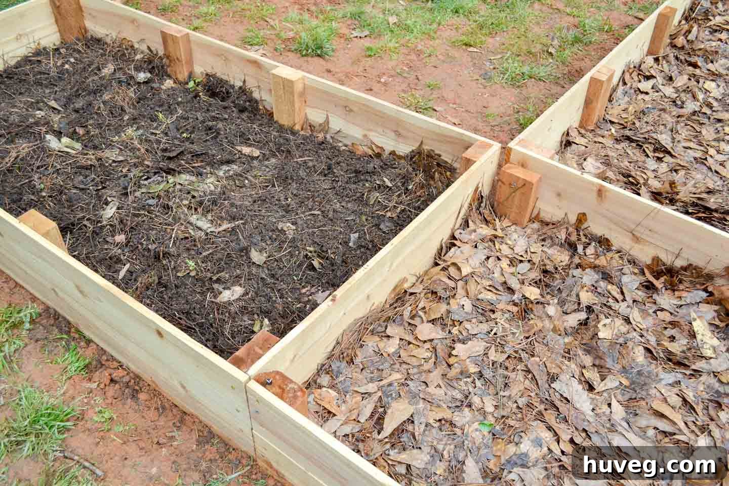 layering raised garden beds with leaves and fresh compost
