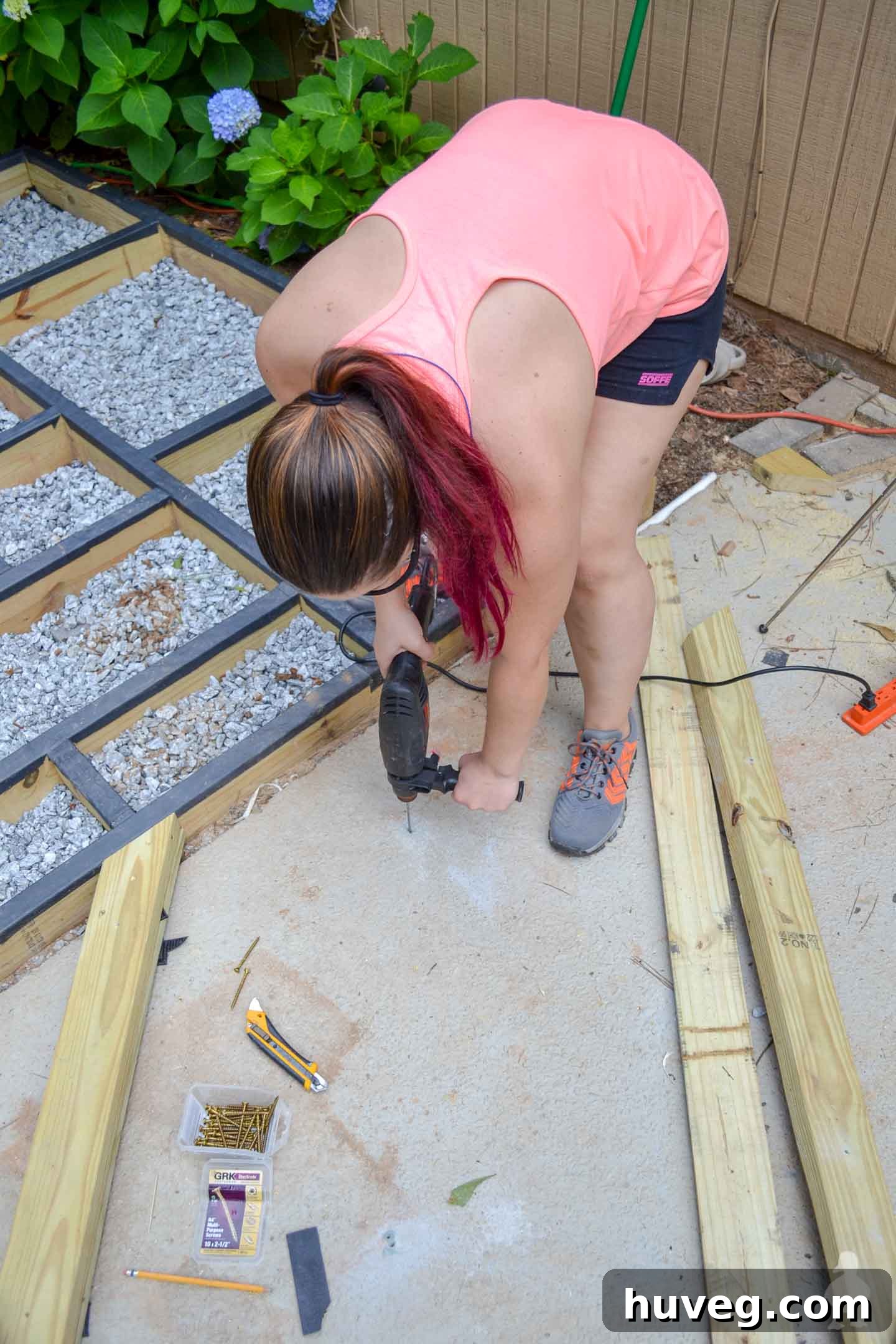 use hammer drill to drill into concrete patio