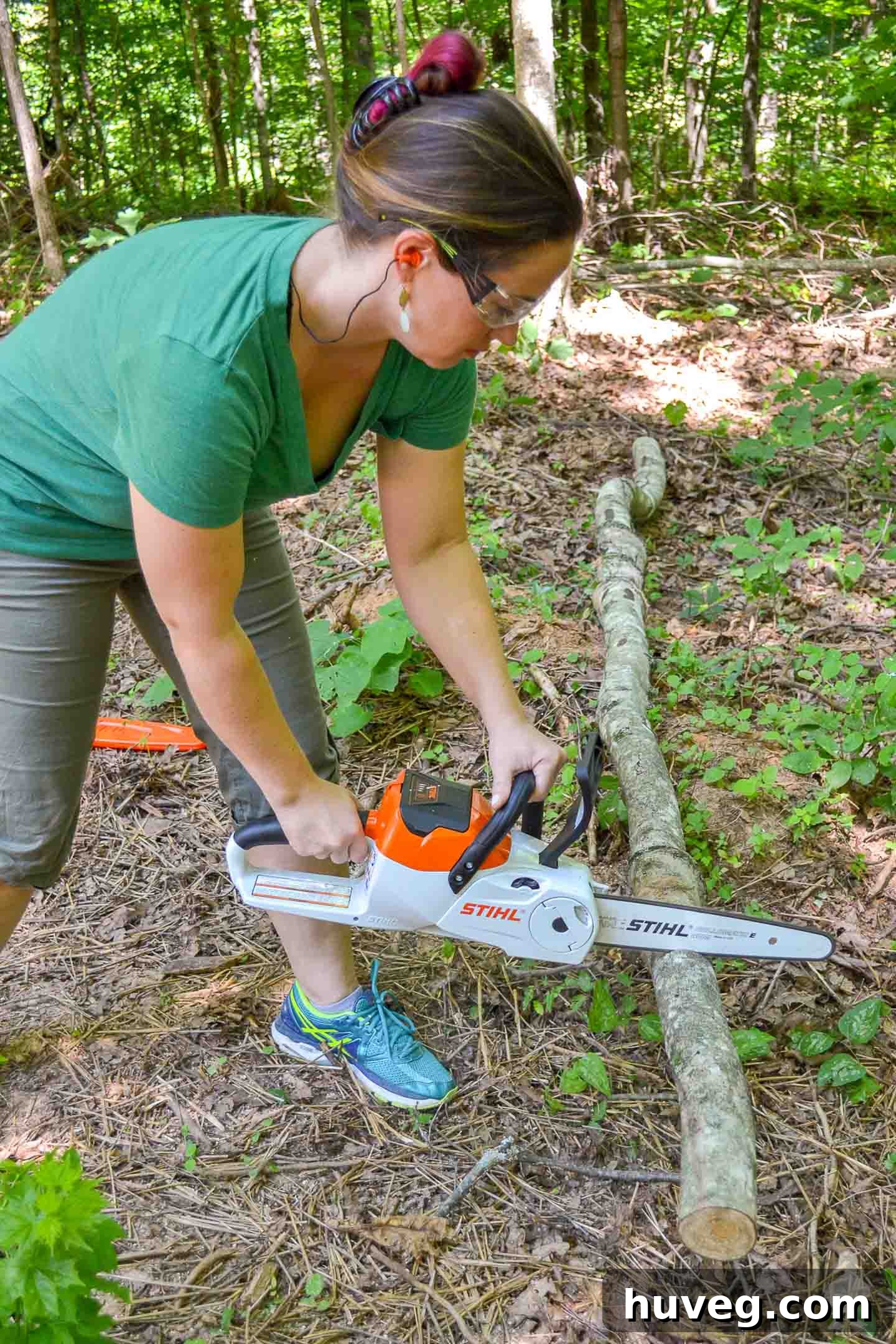 A sequential series of images showing the author efficiently cutting a fallen tree into multiple firewood lengths with a chainsaw.