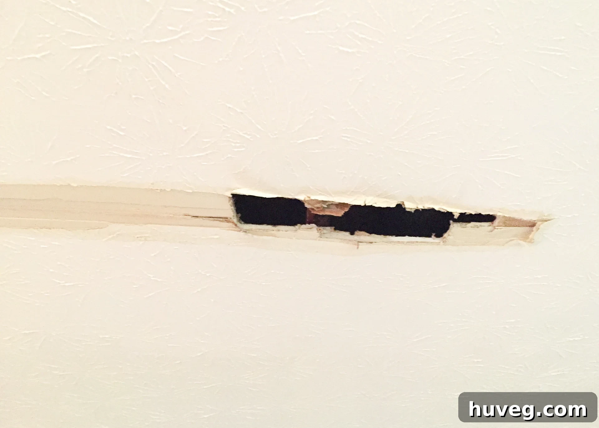 cutting hole in ceiling