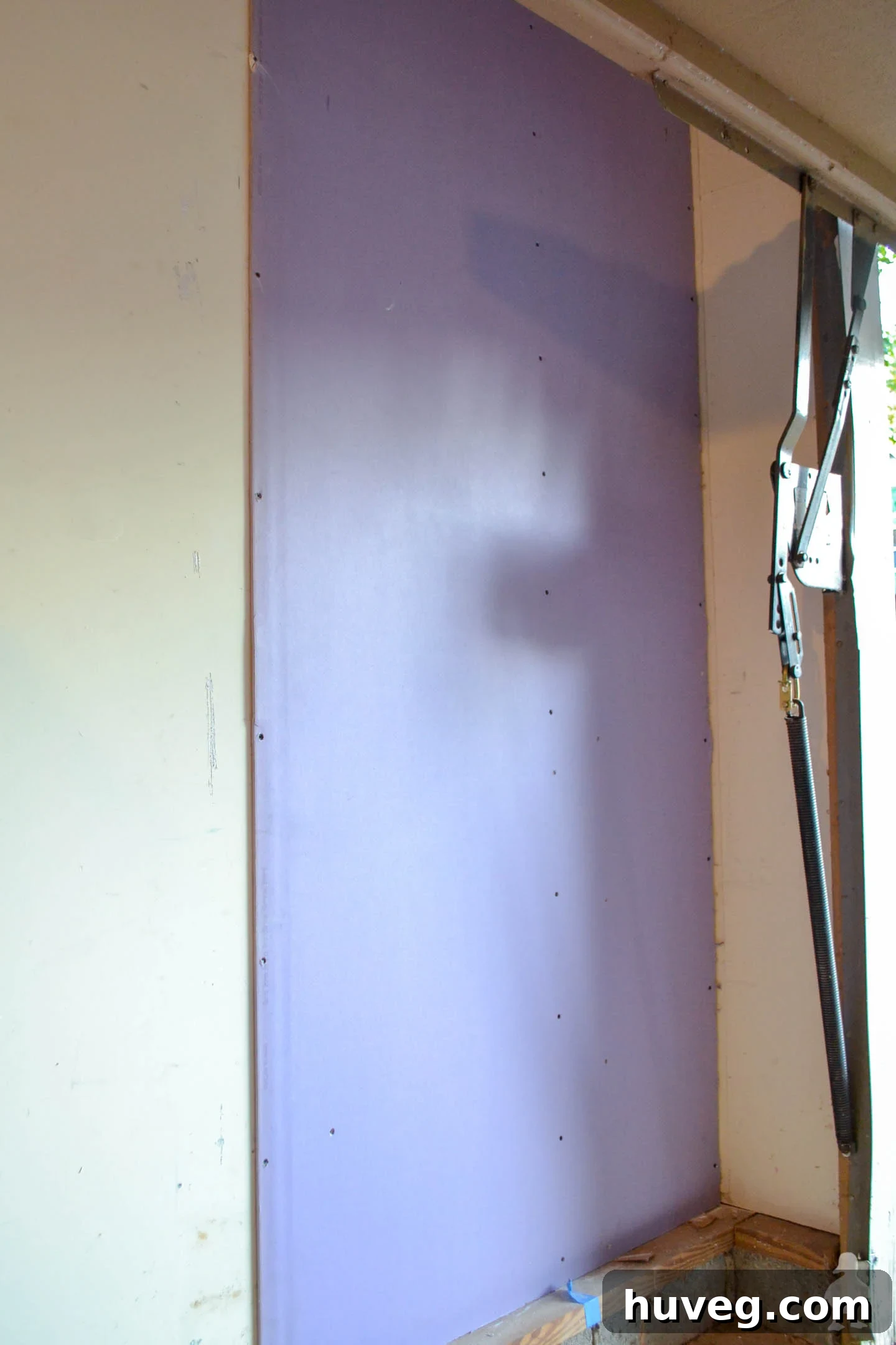 installed first panel of retrofit drywall
