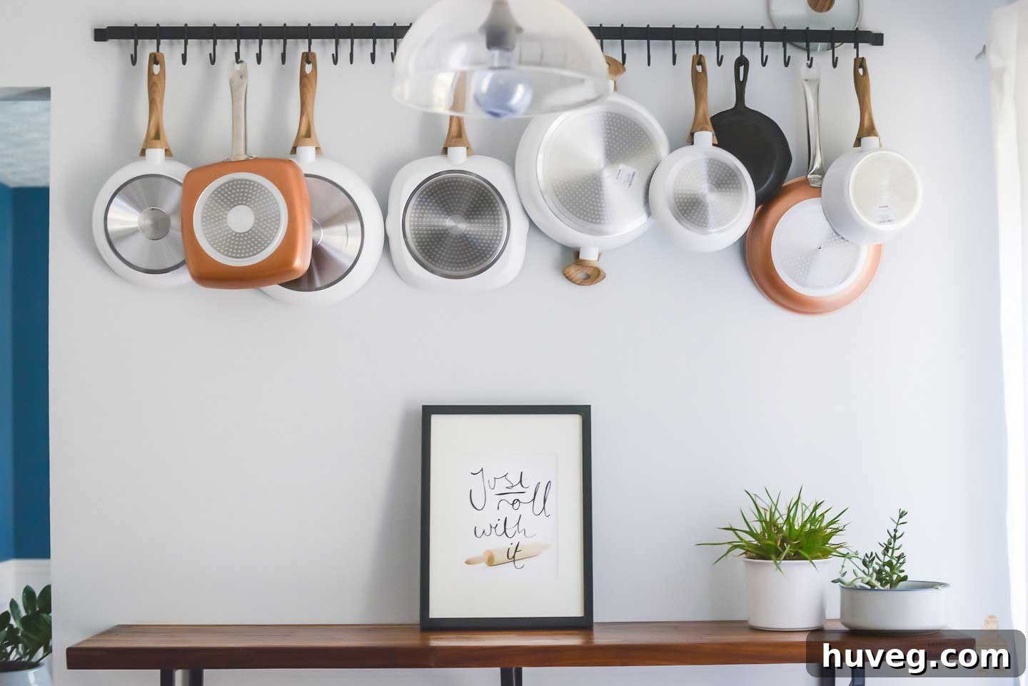 kitchen bar area with pot rack