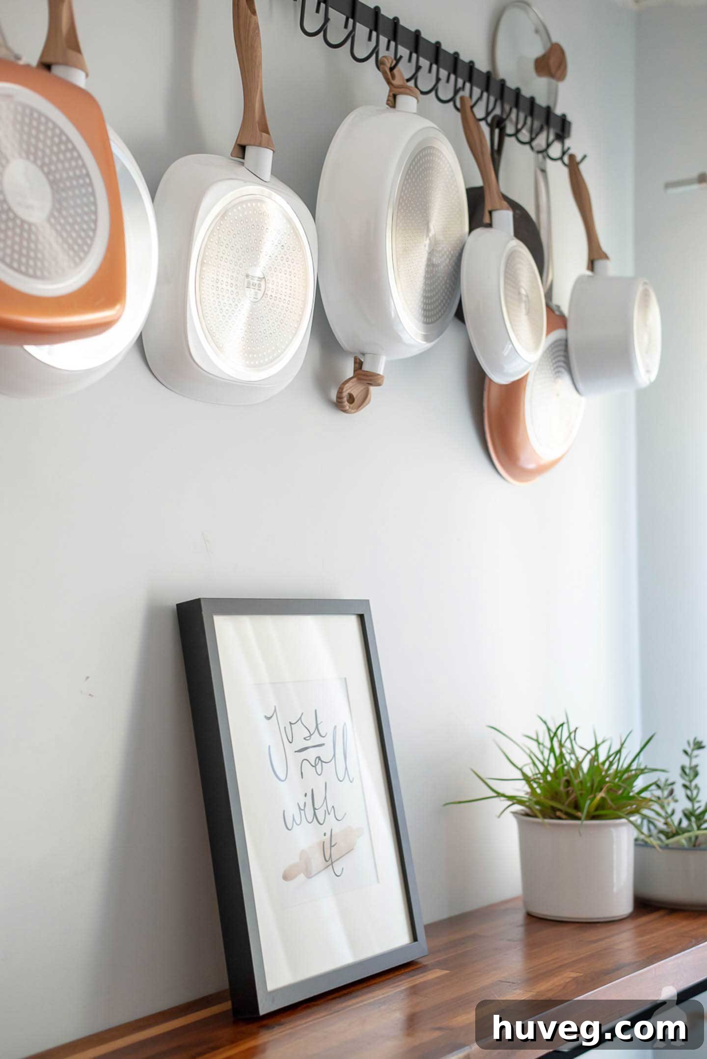 kitchen wall pot rack with-walnut-butcher block countertops
