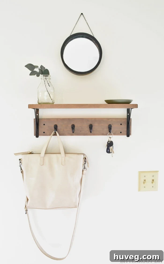 Pinterest graphic: How to Frame a Round Mirror Without a Router, featuring the finished black-framed mirror.