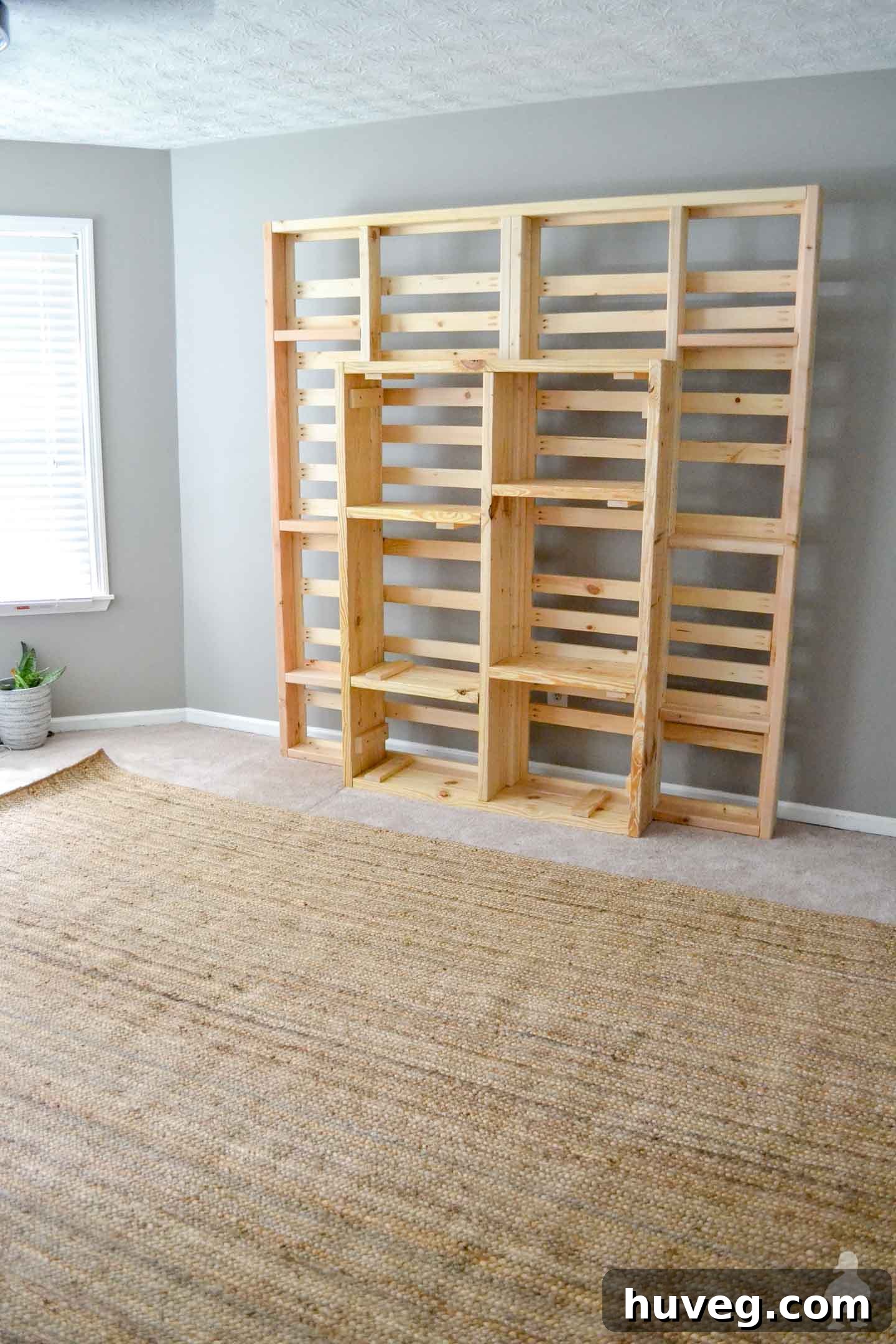 laying down jute rug first, primary bedroom renovation step