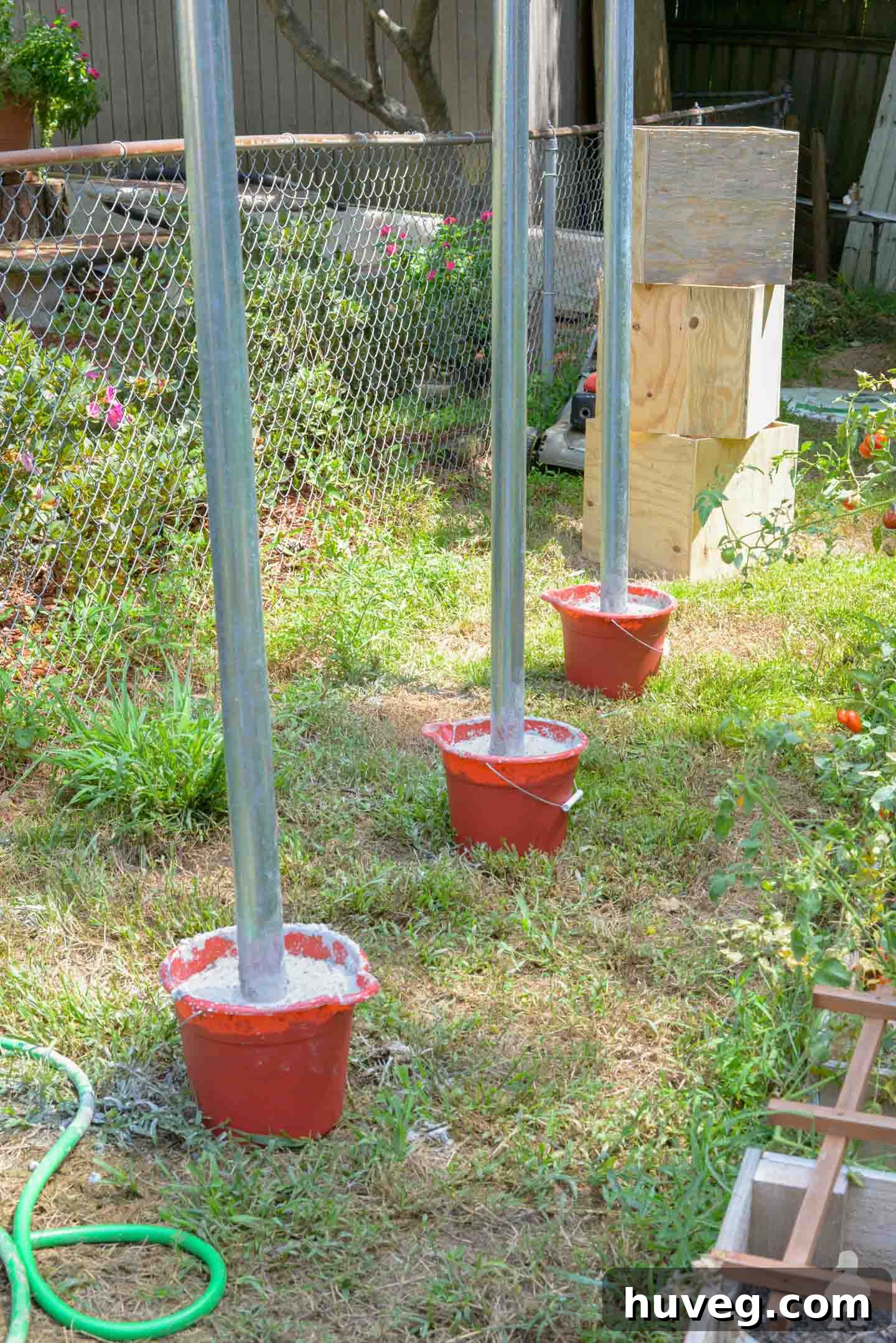 Dollar Store Buckets Filled with Concrete for DIY Light Pole Bases