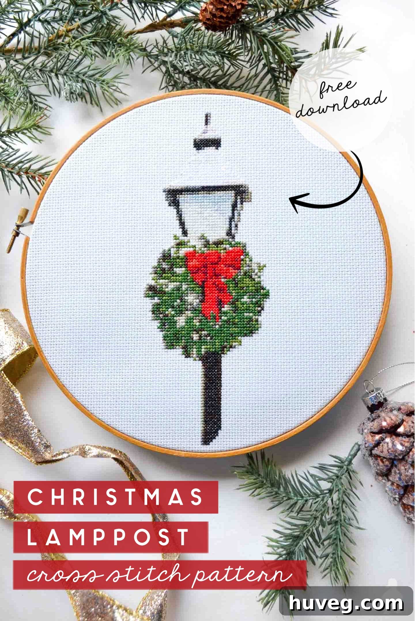 Snowy Christmas Lamppost Cross Stitch Pattern with festive wreath and falling snow