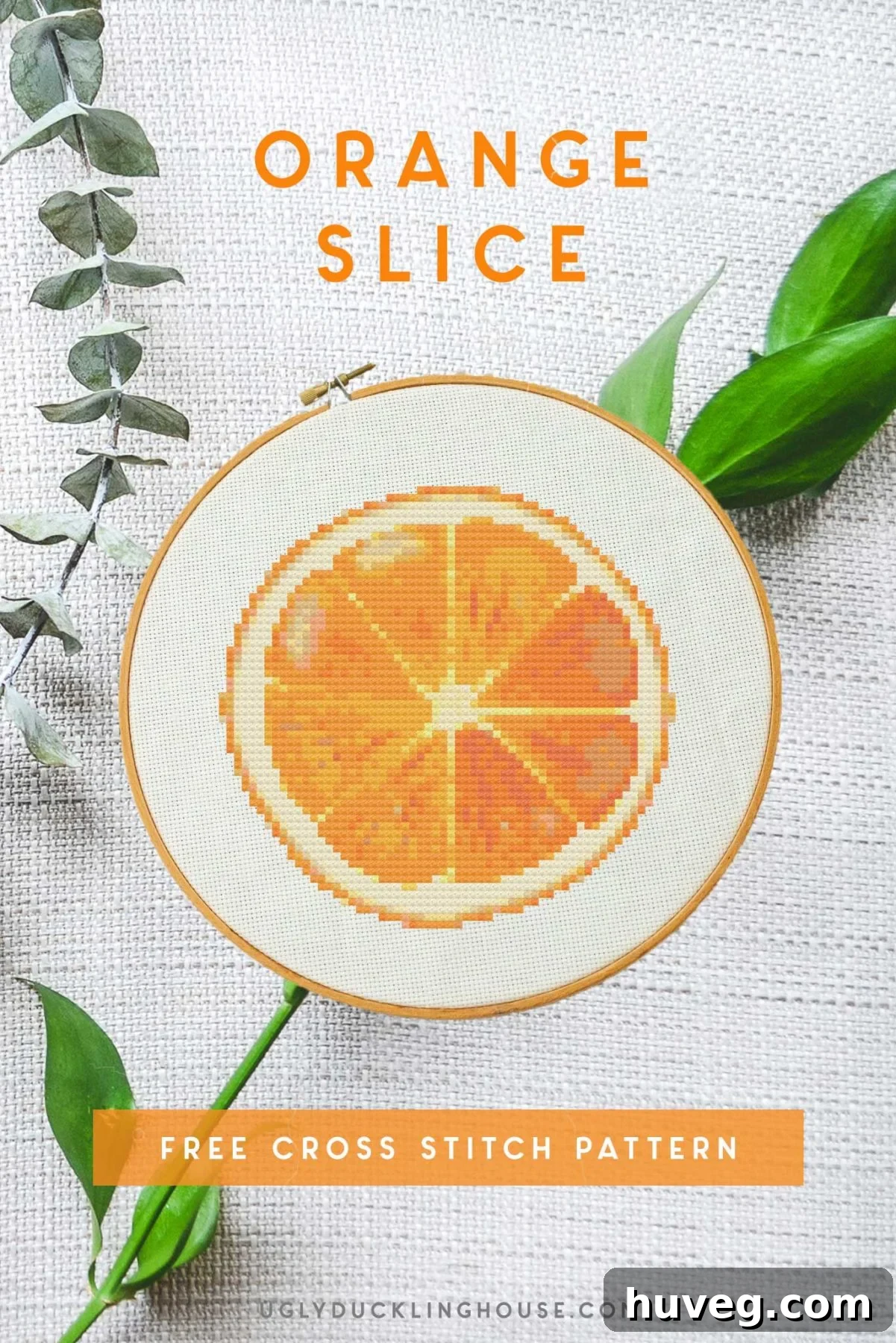 Bright orange slice cross stitch pattern, perfect for kitchen decor or a thoughtful DIY gift.