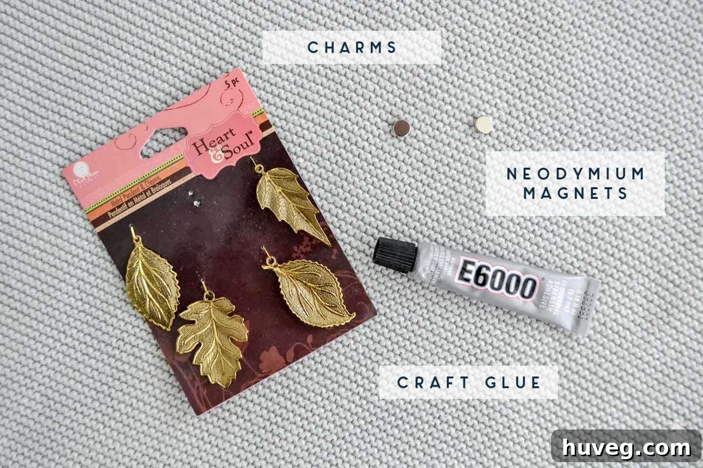 Jewelry charms, E6000 glue, and magnets – the simple components for a DIY needle minder.