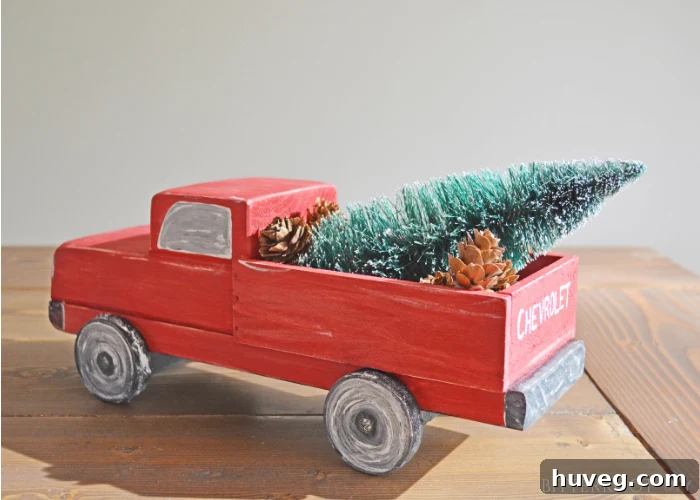 DIY Vintage Christmas Truck painted red with black and white details