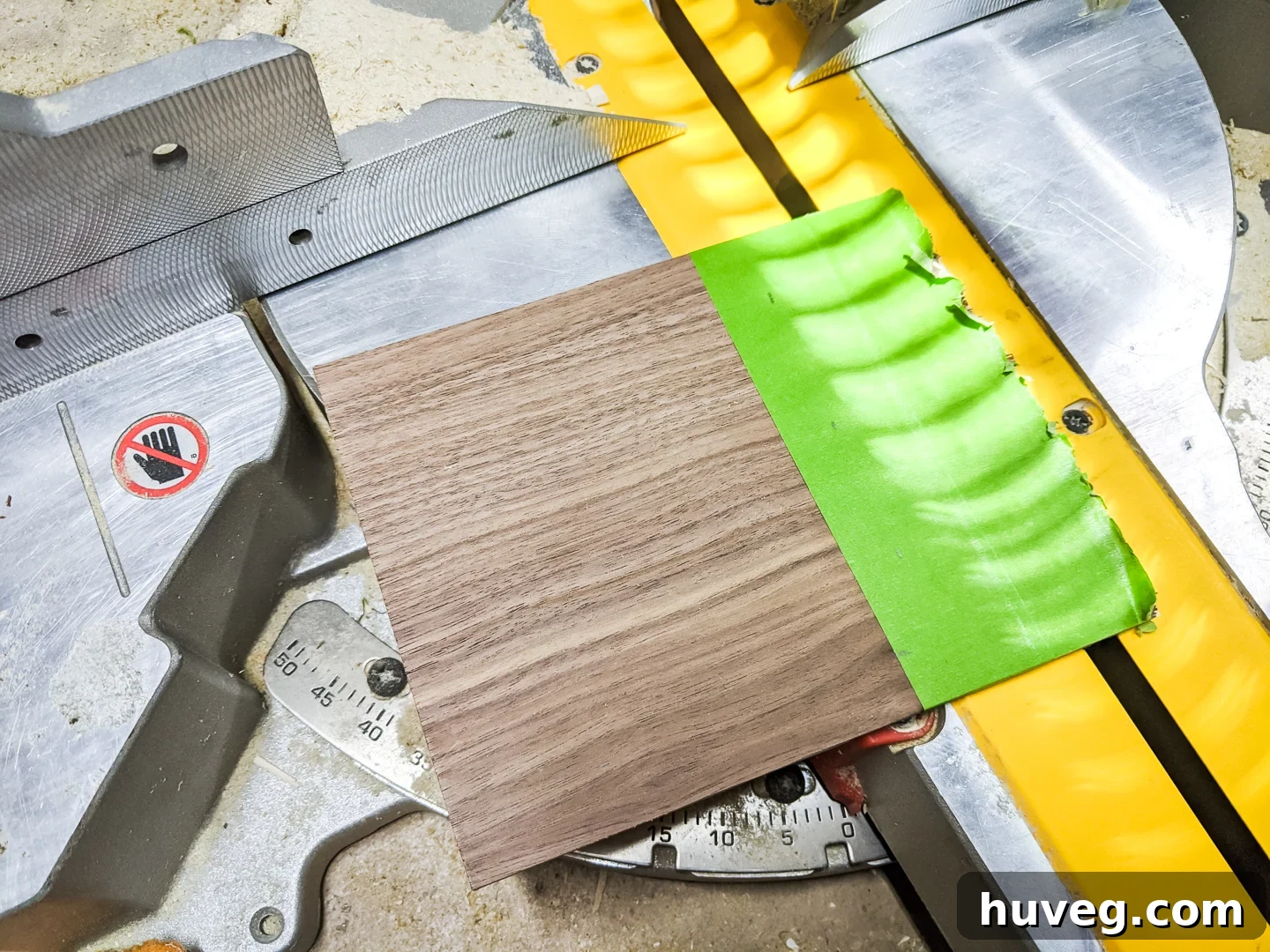Cutting plywood to size using painter's tape to prevent splintering