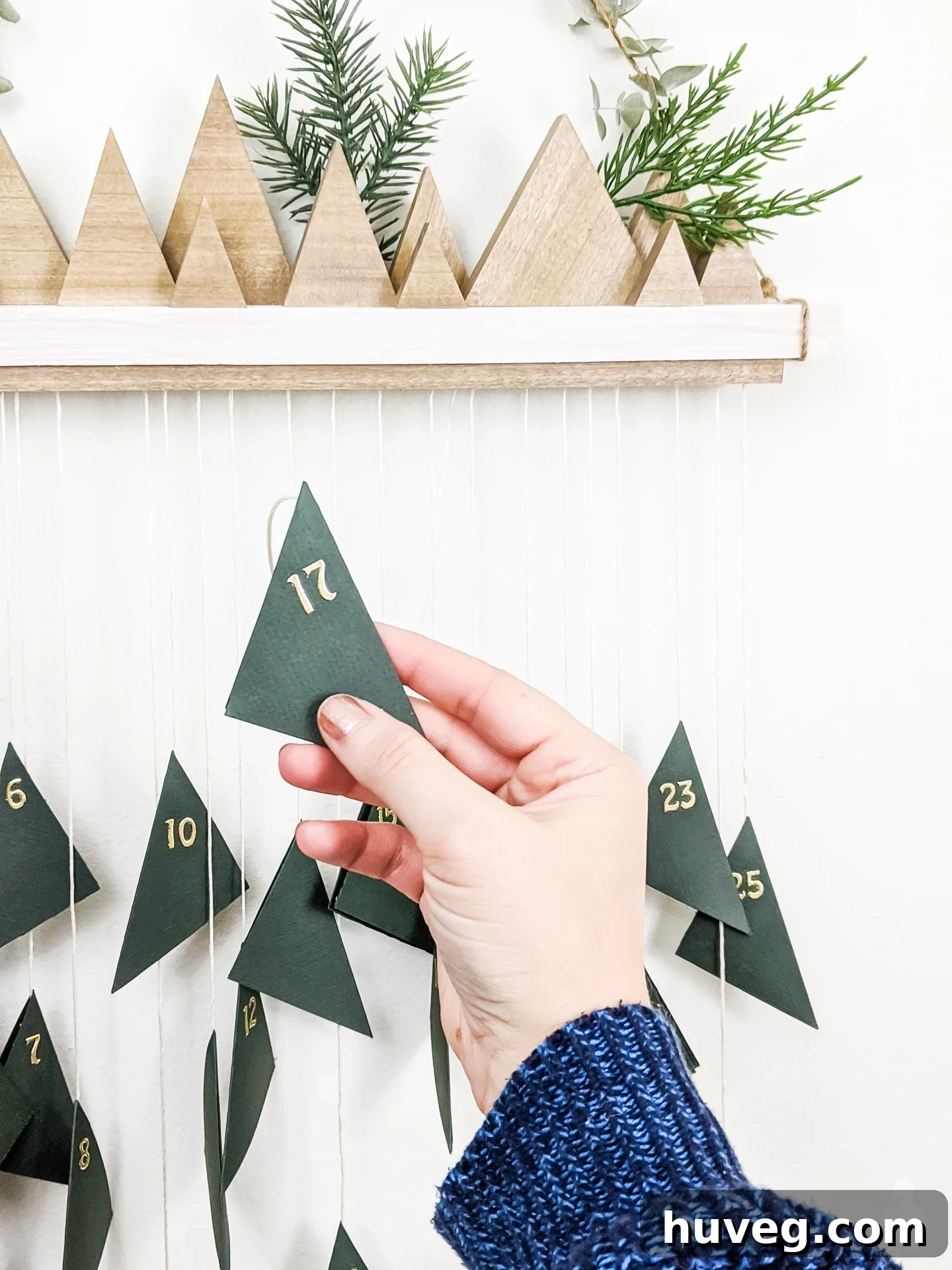 number each triangle of paper with stickers