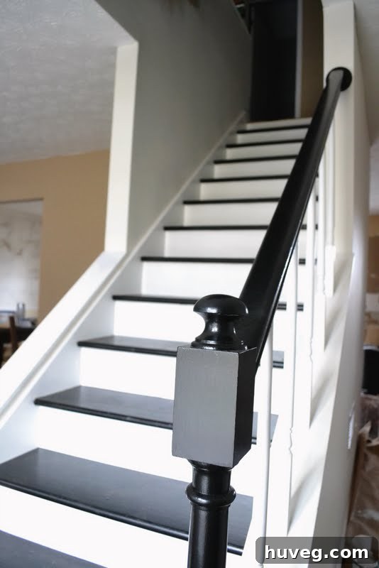 Freshly painted banister and staircase walls