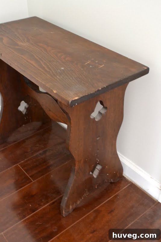 Side view of the entryway bench, showcasing its rustic charm
