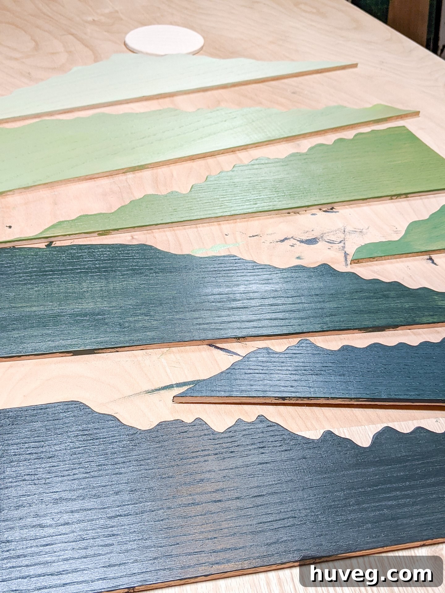 A beautifully crafted layered mountain art piece for a nursery, inspired by vintage park posters.